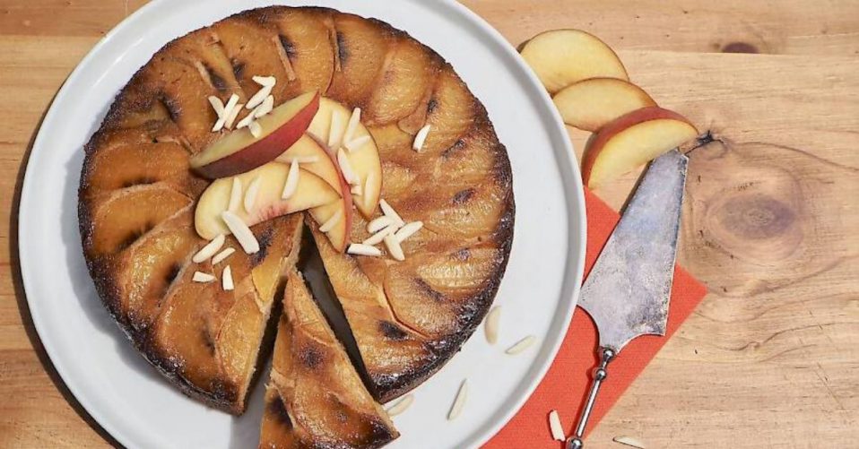 susan joy's peach upside down cake topped with peach slices